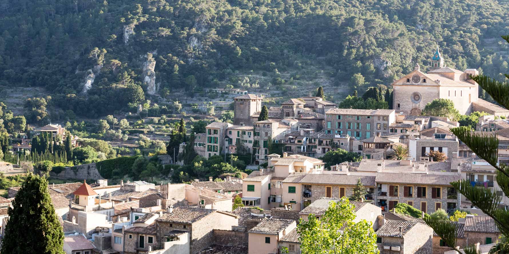 View over Valldemossa with the Valldemossa Hotel on the left and La Cartuja on the right side