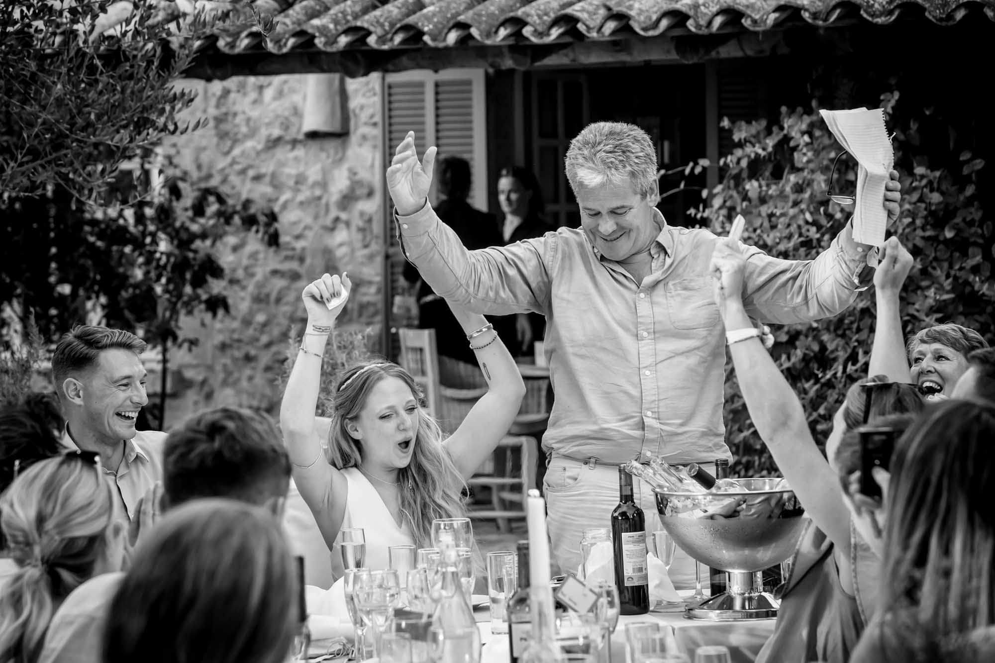 Cathy cheers her dad before his speech at her Mallorca villa wedding